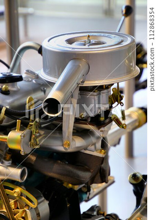 Old car engine... Single barrel carburetor and air cleaner Old car engine... Single barrel carburetor and air cleaner 112868354