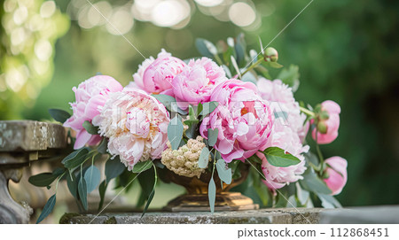 Wedding decoration with peonies, floral decor and event celebration, peony flowers and wedding ceremony in the garden, English country style Wedding decoration with peonies, floral decor and event celebration, peony flowers and wedding ceremony in the garden, English country style 112868451