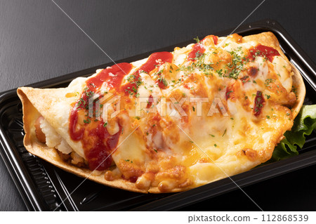 Sausage and potato tortilla grilled with cheese 112868539