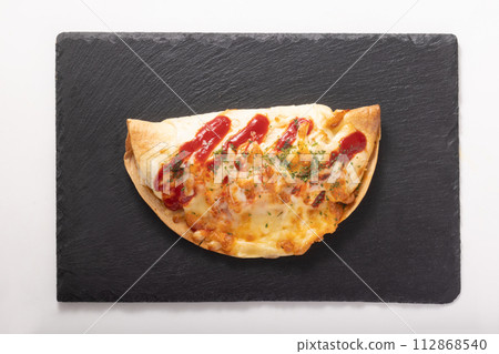 Sausage and potato tortilla grilled with cheese 112868540