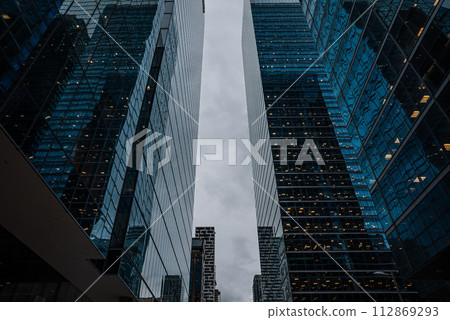 tall skyscrapers buildings looking up perspective, modern architecture of steel and glass, skyline of big city tall skyscrapers buildings looking up perspective, modern architecture of steel and glass, skyline of big city 112869293