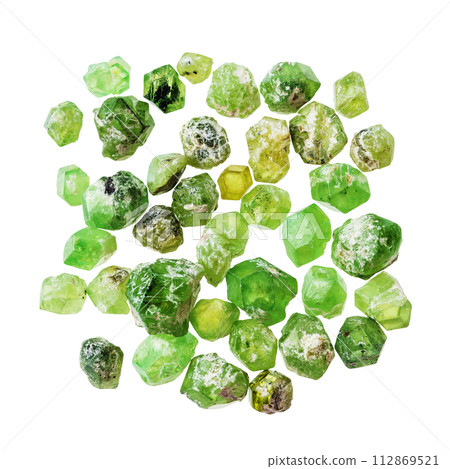 many raw demantoid crystals isolated on white many raw demantoid crystals isolated on white 112869521