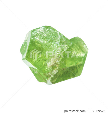 unpolished demantoid mineral isolated on white unpolished demantoid mineral isolated on white 112869523
