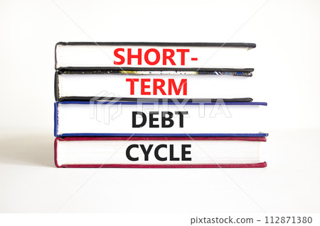 Short-term debt cycle symbol. Concept words Short-term debt cycle on beautiful books. Beautiful white table white background. Business Short-term debt cycle concept. Copy space. Short-term debt cycle symbol. Concept words Short-term debt cycle on beautiful books. Beautiful white table white background. Business Short-term debt cycle concept. Copy space. 112871380