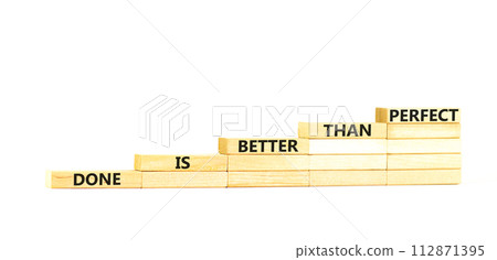 Done is better than perfect symbol. Concept words Done is better than perfect on wooden blocks stairs. Beautiful white table white background. Business, done is better than perfect concept. Copy space 112871395