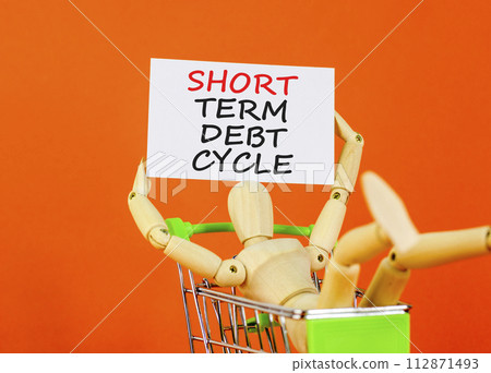 Short term debt cycle symbol. Concept words Short term debt cycle on beautiful white paper. Beautiful orange background. Businessman model. Business Short term debt cycle concept. Copy space 112871493