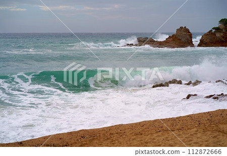 Mediterranean Sea. Sea wave. An abstract background of seawater flow under light exposure Mediterranean Sea. Sea wave. An abstract background of seawater flow under light exposure 112872666