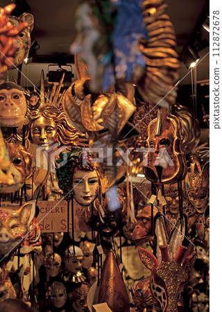 masks in a store in Venice. Venetian masks in store display in Venice. Annual carnival in Venice is among the most famous in Europe. Its symbol is the Venetian mask 112872678