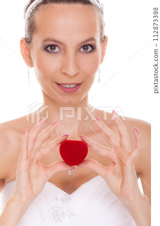 Joyful bride woman showing engagement ring box. Joyful bride woman showing engagement ring box. 112873398