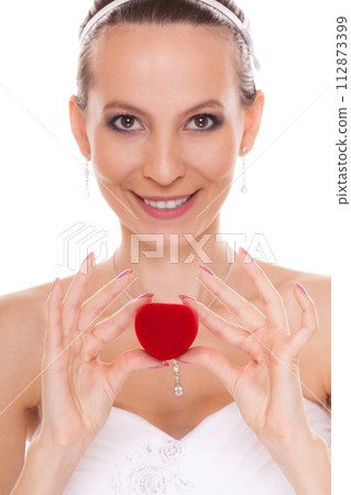 Happy bride woman showing engagement ring box. Happy bride woman showing engagement ring box. 112873399