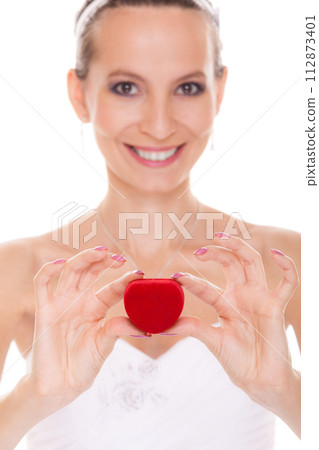 Excited bride woman showing engagement ring box. Excited bride woman showing engagement ring box. 112873401
