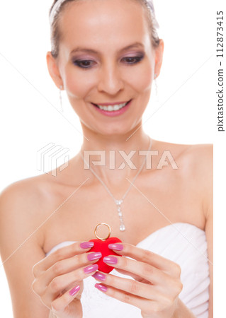 Excited bride woman showing engagement ring box. 112873415
