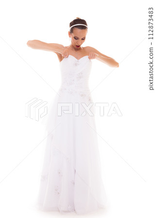 Full length bride in white wedding gown isolated 112873483