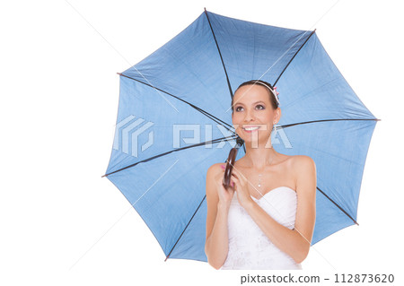 Pretty bride woman in white dress holding umbrella Pretty bride woman in white dress holding umbrella 112873620