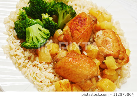 chicken thighs with pineapple, rice and broccoli chicken thighs with pineapple, rice and broccoli 112873804