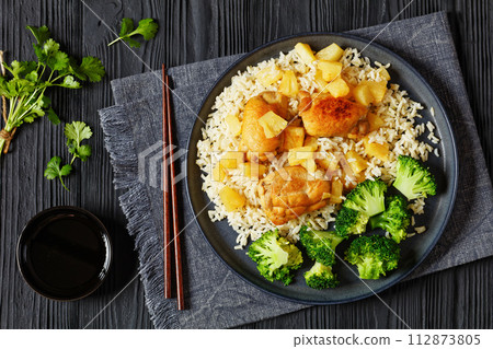 chicken thighs with pineapple, rice and broccoli chicken thighs with pineapple, rice and broccoli 112873805