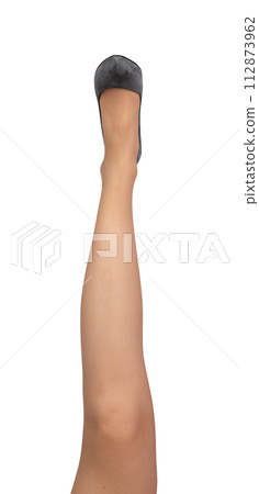 Slim slender women leg up, wearing gray heeled shoes isolated on white Slim slender women leg up, wearing gray heeled shoes isolated on white 112873962