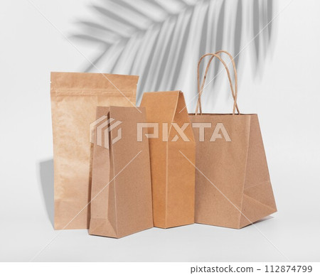 Craft paper bag, box. Brown beige eco packages, packs for product, gifts 112874799