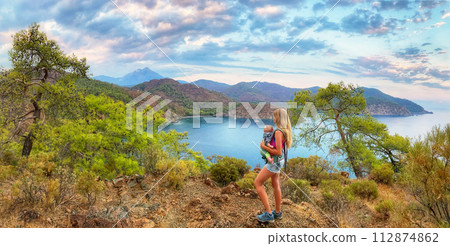 Mother and child travel the Lycian trail, Turkey 112874862