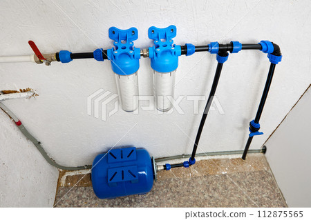 Utility room which water bladder tank and purification filters for cold drinking water of domestic water supply system. Utility room which water bladder tank and purification filters for cold drinking water of domestic water supply system. 112875565