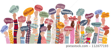 Many hands raised of diverse and multicultural children and teens holding speech bubbles with text Welcome in various international languages. Diversity kids. Communication Many hands raised of diverse and multicultural children and teens holding speech bubbles with text Welcome in various international languages. Diversity kids. Communication 112877193