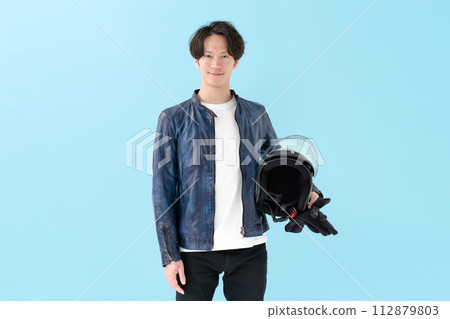 male rider with helmet male rider with helmet 112879803
