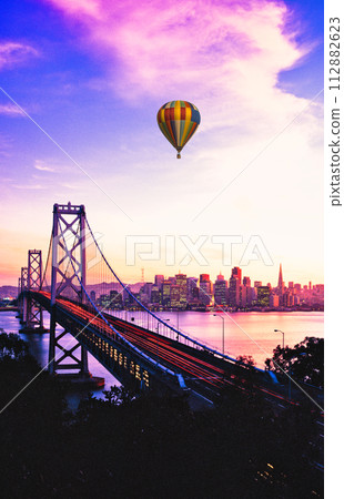 Balloons floating over San Francisco's Bay Bridge 112882623