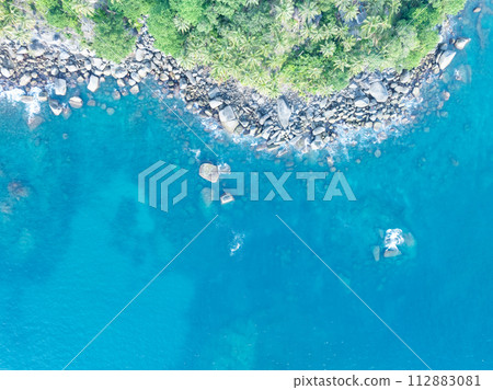 Amazing tropical seashore landscape background,Top view waves crashing on rocks Amazing tropical seashore landscape background,Top view waves crashing on rocks 112883081