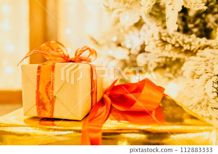 presents under Christmas tree, festive and celebratory atmosphere. presents under Christmas tree, festive and celebratory atmosphere. 112883333