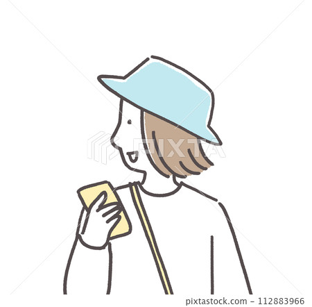 A woman checking her cell phone while going out 112883966