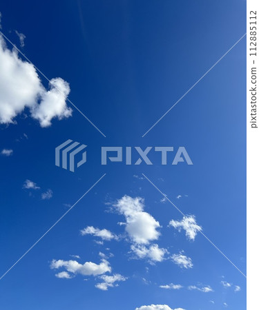 The blue sky and clouds floating in the blue sky on a clear day 112885112