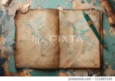 Vintage pen and old map on old paper background on table, travel concept Vintage pen and old map on old paper background on table, travel concept 112885180