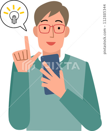 Upper body of a man pointing with a smile while looking at his smartphone 112885344