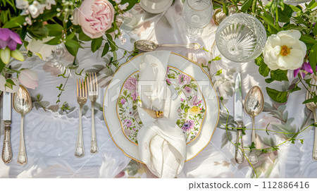 Easter tablescape decoration, floral holiday table decor for family celebration, spring flowers, Easter eggs, Easter bunny and vintage dinnerware, English country and home styling 112886416