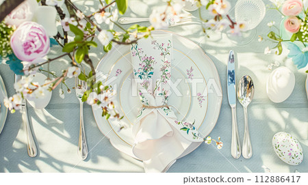 Easter tablescape decoration, floral holiday table decor for family celebration, spring flowers, Easter eggs, Easter bunny and vintage dinnerware, English country and home styling Easter tablescape decoration, floral holiday table decor for family celebration, spring flowers, Easter eggs, Easter bunny and vintage dinnerware, English country and home styling 112886417