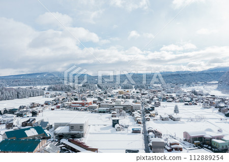 Drone photography: Rural village covered in pure white snow Drone photography: Rural village covered in pure white snow 112889254