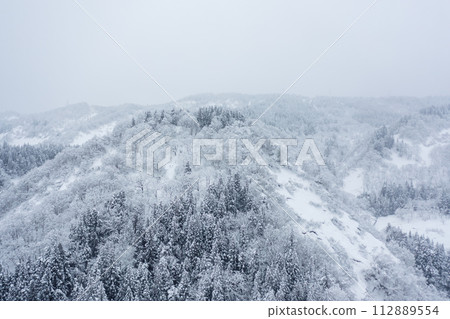 Drone photography: Natural scenery covered in pure white snow 112889554