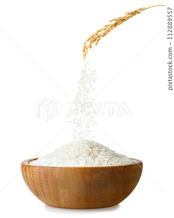 rice falling from ear in bowl isolated on white background 112889557