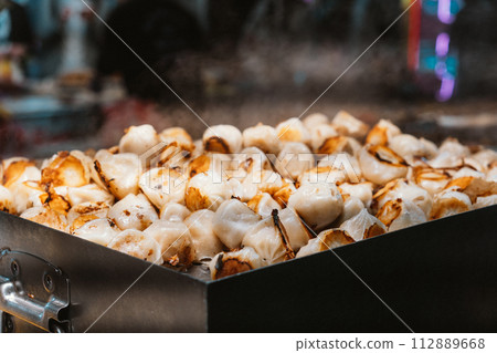 Taiwan night market raw fried bao 112889668