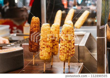 Taiwan Night Market Eating Grilled Corn 112890505