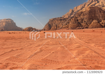 Wadi Rum desert with tire tracks in Jordan Wadi Rum desert with tire tracks in Jordan 112890920