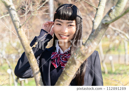 High school girl in the schoolyard High school girl in the schoolyard 112891289