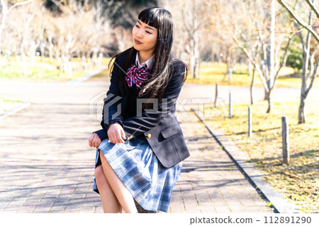 High school girl in the schoolyard 112891290