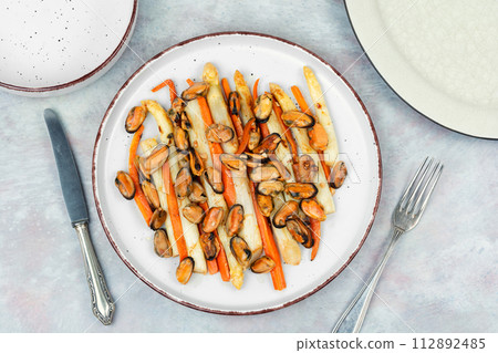 Roasted mussels with asparagus, salad. Roasted mussels with asparagus, salad. 112892485