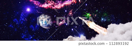 Dark space shuttle launch in the clouds with stars on background.Spaceship flight. Elements of this image furnished by NASA Dark space shuttle launch in the clouds with stars on background.Spaceship flight. Elements of this image furnished by NASA 112893192