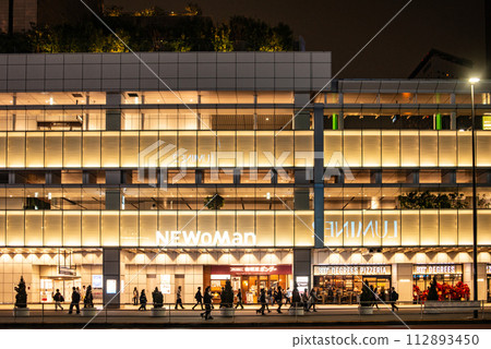 Shopping mall in front of the station at night Shopping mall in front of the station at night 112893450