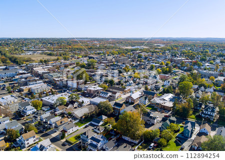 Small American town in countryside, surrounded by private homes in state of New Jersey 112894254