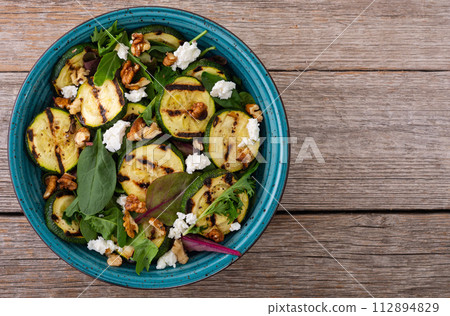 Grilled green zucchini salad 112894829