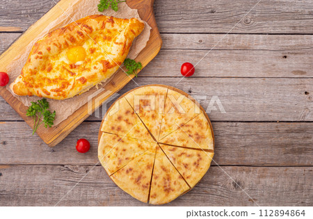 Homemade adjarian khachapuri with egg 112894864
