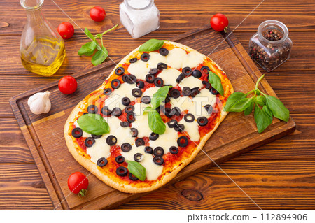 Traditional italian pizza with vegetables Traditional italian pizza with vegetables 112894906